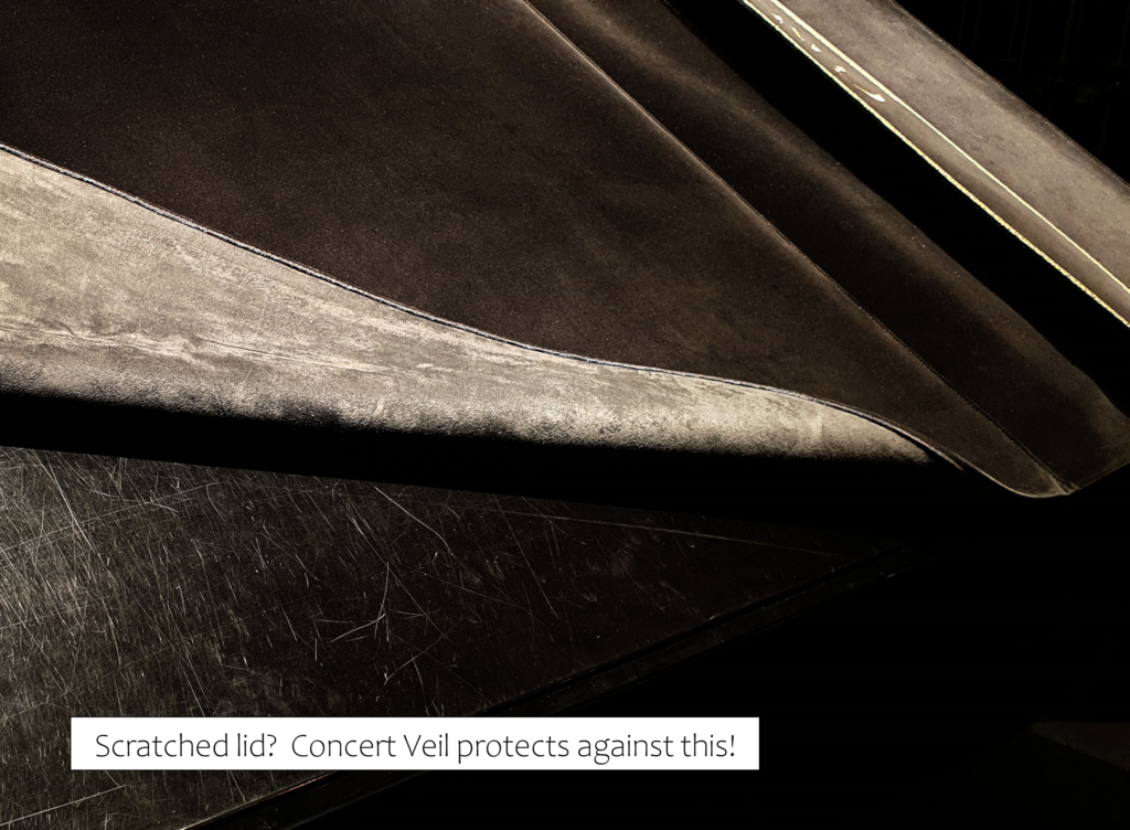 Scratched lid - grand piano